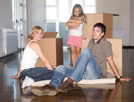 Professional removals team handling furniture during house removals in Barkingside